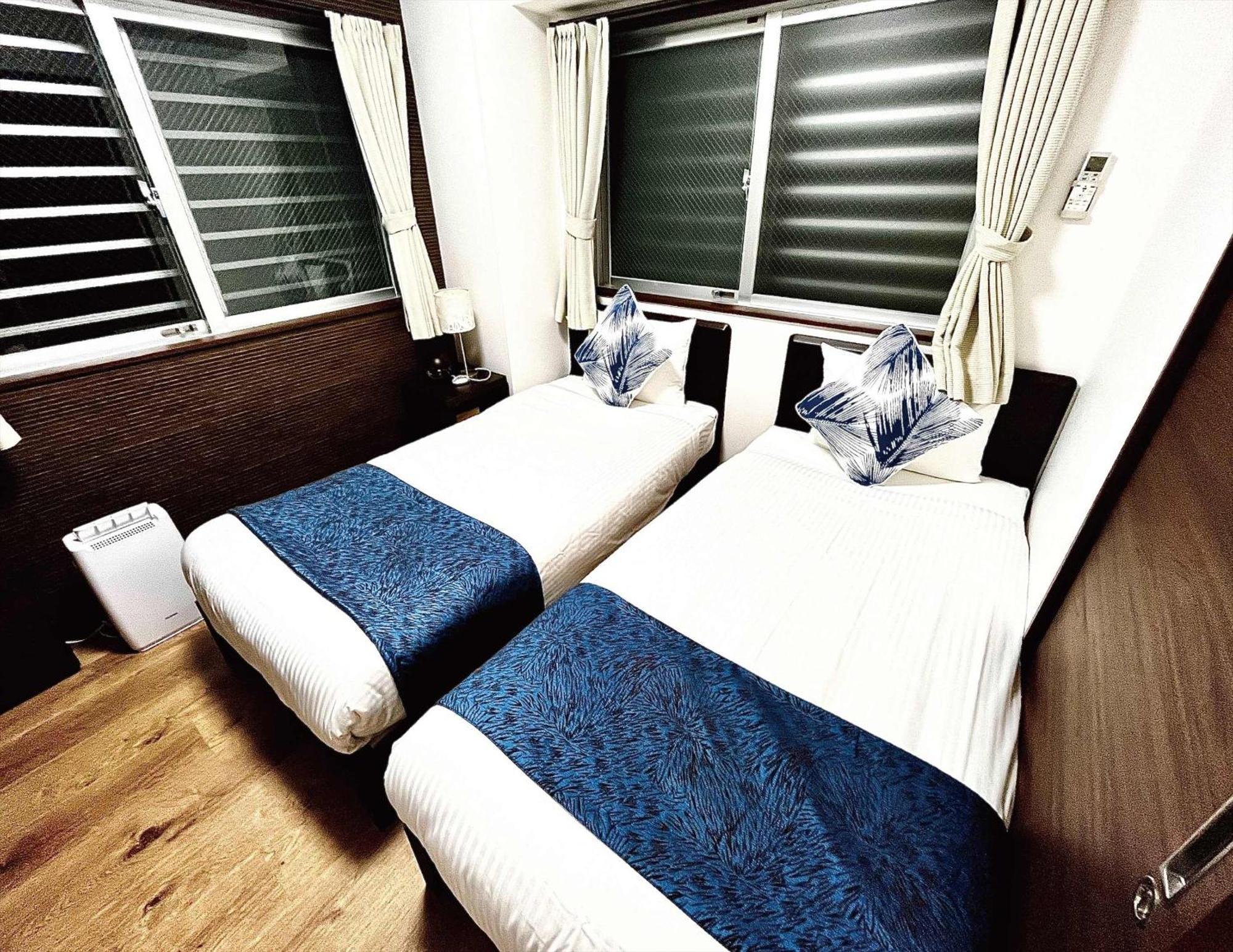 Zoe Resort The Sunset Village Okinawa Чятан Номер фото